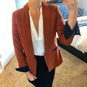 Copper blazer with navy pocket detail